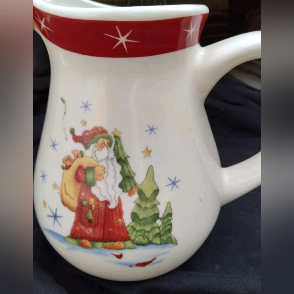 Ceramic milk pitcher with holiday scene